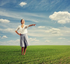 woman laughing and pointing